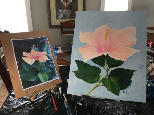 Painting of large light pink hibiscus flower beside photo of same flower