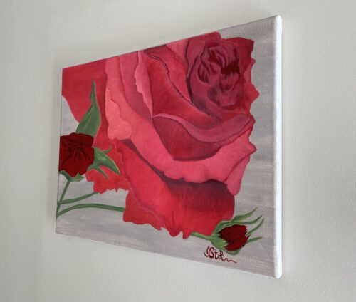 Close up painting of a bright red rose in bloom