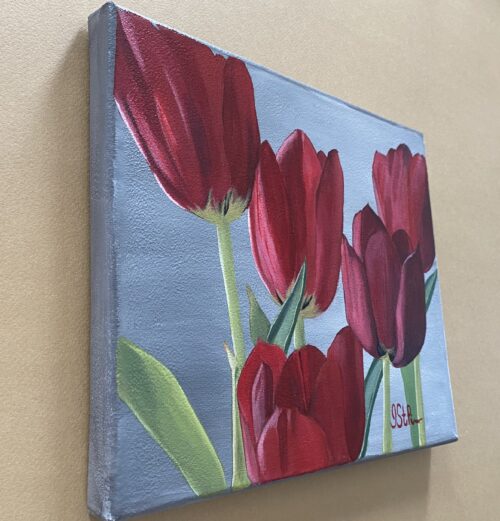 Close up painting of 5 red tulips