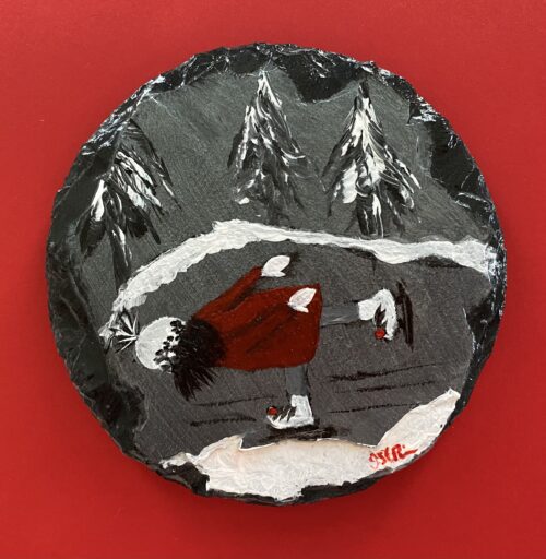 Coaster with a painting of a girl in a red jacket skating on it