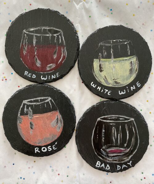 Set of 4 coasters each painted with a different glass of wine on it