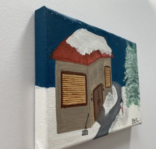 Small painting of a snowy scene with a house and snowman