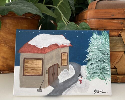 Small painting of a snowy scene with a house and snowman