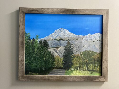 A painted view of mountains and trees in Kananaskis, Alberta