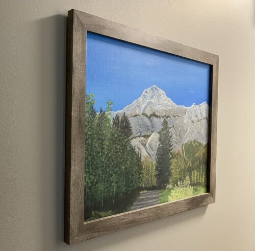 A painted view of mountains and trees in Kananaskis, Alberta