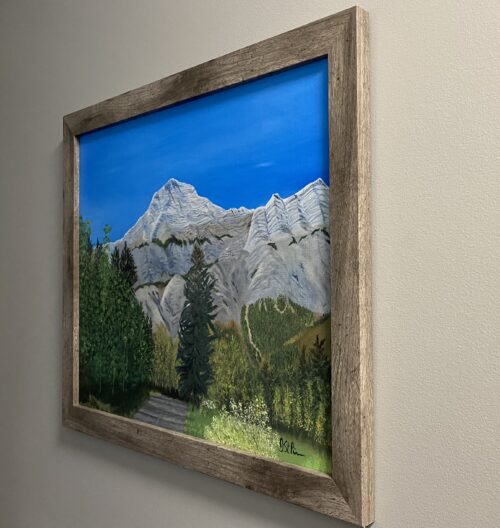 A painted view of mountains and trees in Kananaskis, Alberta