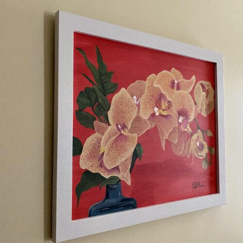 Painting of a yellow orchid on a dark orange background