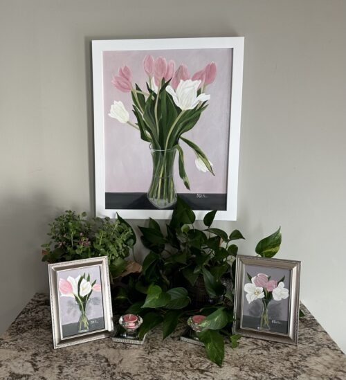 A painting of pink and white tulips in a clear vase