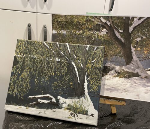 A painting of a snow covered tree at the edge of water