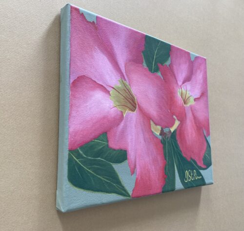 A painting of a tropical pink Mandevilla blooms on a pale green background