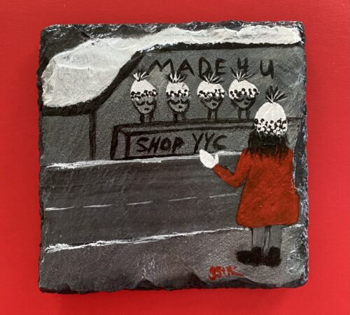 A photo of 4 slate coasters painted with a girl shopping at Calgary markets