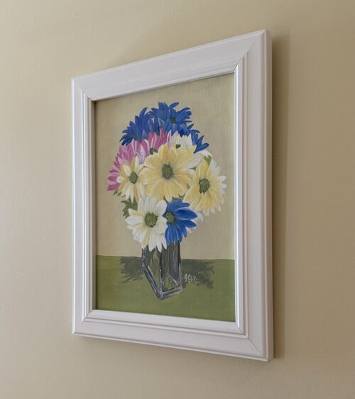 A painting of brightly coloured daisies in a clear rectangular vase