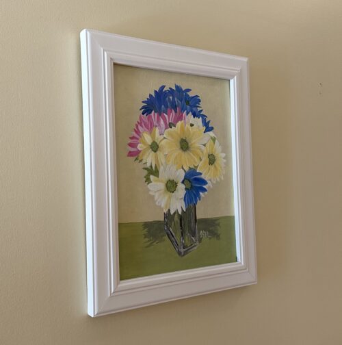 A painting of brightly coloured daisies in a clear rectangular vase