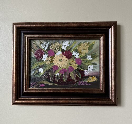 A palette knife painting of pink and yellow flowers in a basket