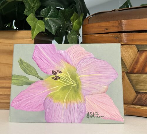 A framed painting of a pink lily on a green background