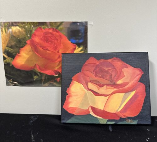 A painting of a beautiful red and orange rose bloom on a dark background